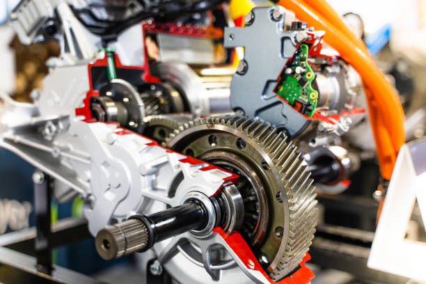istock Engine sprocket And electronic circuit boards for control.soft focus.Cross-section of a car gearbox. mechanics work in the garage. 1170795659