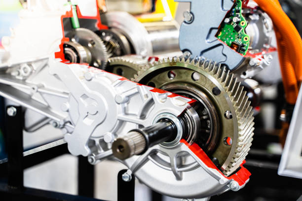 istock Engine sprocket And electronic circuit boards for control.Cross-section of a car gearbox. mechanics work in the garage.Shallow focus effect. 1170795667