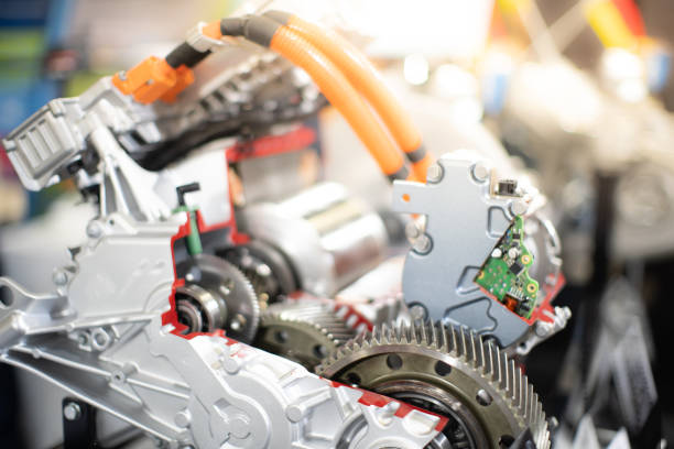 istock Engine sprocket And electronic circuit boards for control.soft focus.Cross-section of a car gearbox. mechanics work in the garage. 1170795691