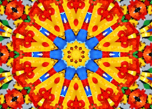 Colorful building blocks through kaleidoscope lens.