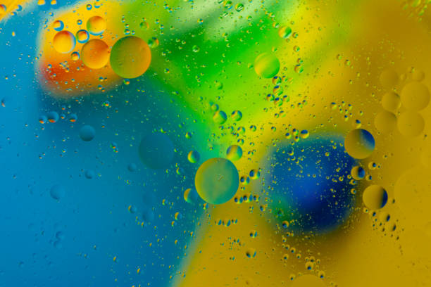 istock Micro molecular abstract pattern of colored oil bubbles on water. 1170799924