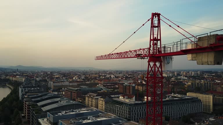 Drone view on construction site and crane - construction industry and development