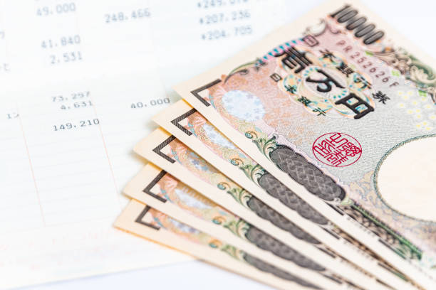 bankkontobuch - japanischer yenschein stock-fotos und bilder