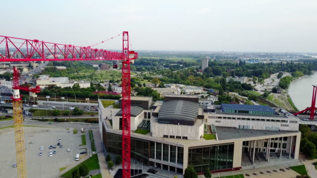 Drone view on construction site and crane - construction industry and development