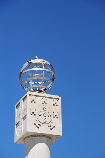Esfera armilar, escudo portugués y cruz frente al ayuntamiento de Moita, Portugal photo