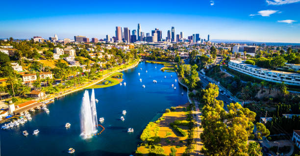 Los Angeles California Echo Park With Fountain and Afternoon View of the Cityscape Skyline of the second largest city Aerial drone view above Los Angeles California 2019 over Echo Park Lake Pond Boats and traffic of the congested huge cityscape skyline of the downtown skyscrapers in the background August 2019 - Los Angeles California Echo Park With Fountain and Afternoon View of the Cityscape Skyline of the second largest city los angeles aerial stock pictures, royalty-free photos & images