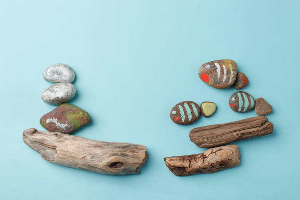istock Happy family concept - drawing stone fish on blue background, Creative DIY kids idea, kindergarten, daycare imagination skill games 1170812015