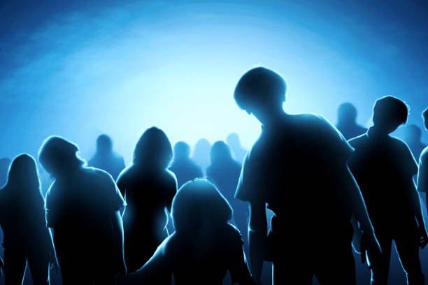 istock Silhouette of zombies crowds at night 1170814695