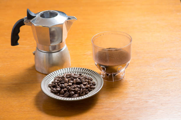 istock Moka pot and coffee beans and grinder. 1170815897
