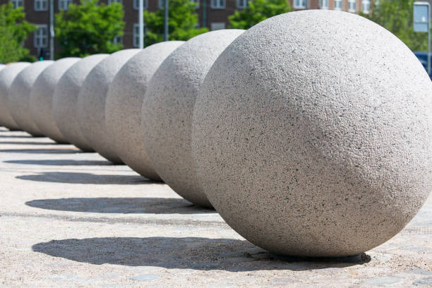 Copenhagen, Denmark - June 22, 2019: Decorative great stone spheres on the Christiansborg Palace Square