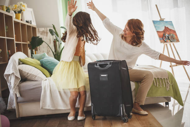 istock Happy mother and daughter ready for vacation 1170825652