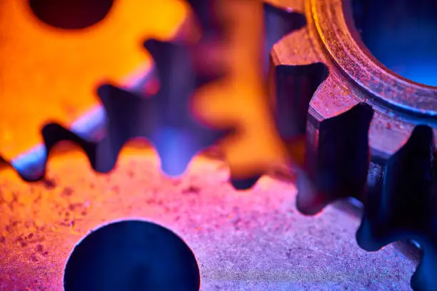 Photo of Gears: colorful, close-up, abstract concept for teamwork and unity