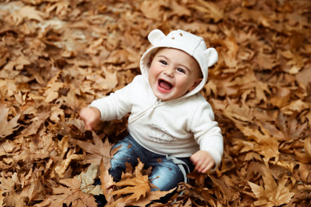istock Sweet child having fun in the forest 1170827082
