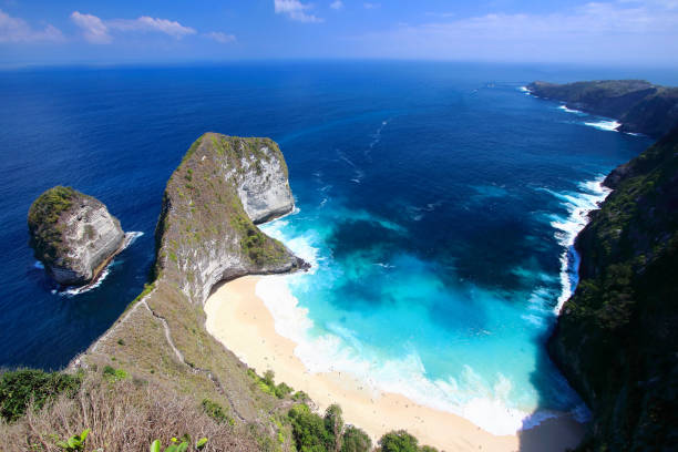 Main view of kelingking beach, on of the most amazing spots in Nusa Penida Island, Bali Main view of kelingking beach, on of the most amazing spots in Nusa Penida Island, Bali. kelingking beach stock pictures, royalty-free photos & images