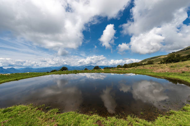 istock Small lake with reflections - Monte Baldo Alps Italy 1170838306