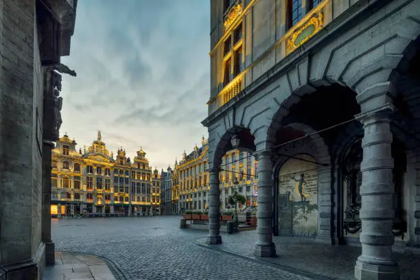 Charles Buls Monument (dates back to 19th Century) and The Grand Place (Grand Square) in Brussels, Belgium. Built structures dates back to between 15th and 17th century.