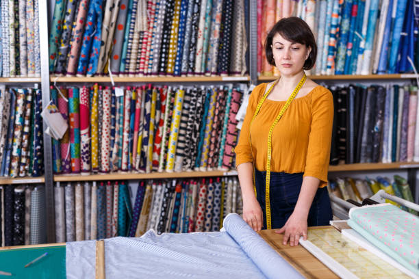 istock Female owner of fabric store 1170839833