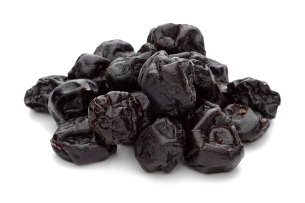 istock Heap of dried blueberries isolated on white 1170840279