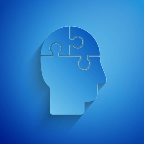 istock Paper cut Human head puzzles strategy icon isolated on blue background. Thinking brain sign. Symbol work of brain. Paper art style. Vector Illustration 1170840352