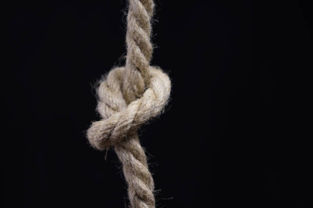 istock Rope with knot on black background 1170842765