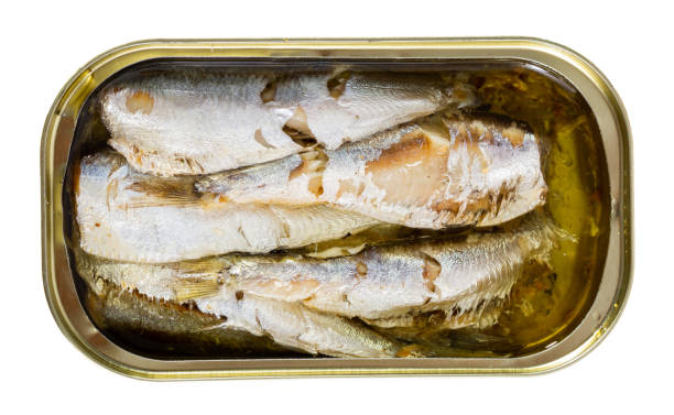 istock Tin can with smoked sprats, sardines, closeup 1170845243
