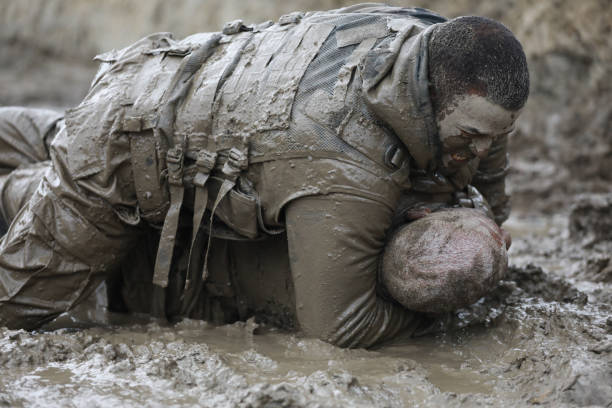 istock Krav Maga military muddy fighting duo 1170853644