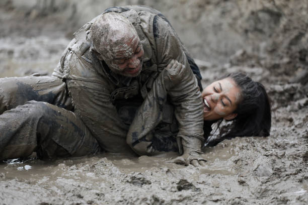 istock Krav Maga military muddy fighting duo 1170853649