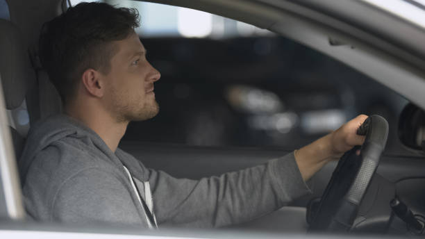 istock Positive driver enjoying comfortable ride, complies with traffic regulations 1170855511