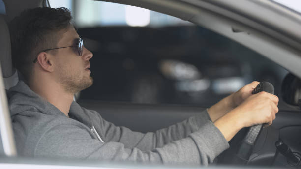 istock Male driver wearing polarized sunglasses, protecting eyes for safe driving 1170855533