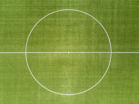 Aerial view of the center circle of a soccer field
