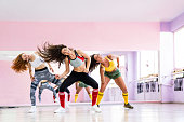 Professional dancer class dancing in dancing studio