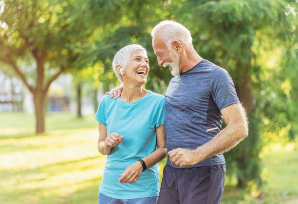 istock Senior couple relax after jogging 1170867082