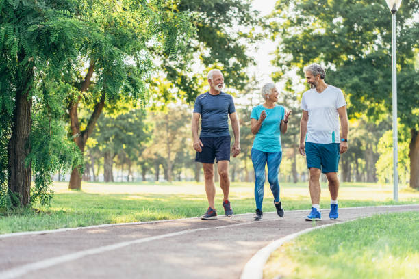 istock Senior friends jogging in the park 1170867084