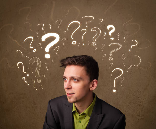istock man with question mark symbols around his head 1170881597