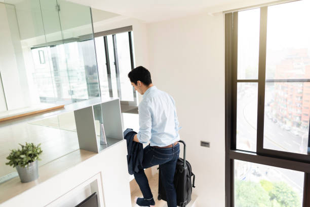 istock Young man just got back from the trip 1170887980
