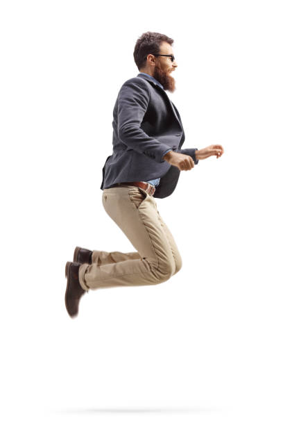 istock Bearded man jumping out of happiness 1170888582
