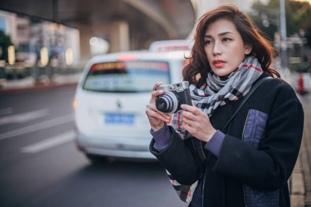 istock Lady photographer downtown 1170889069