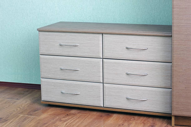 istock Small beige chest of drawers 1170891889