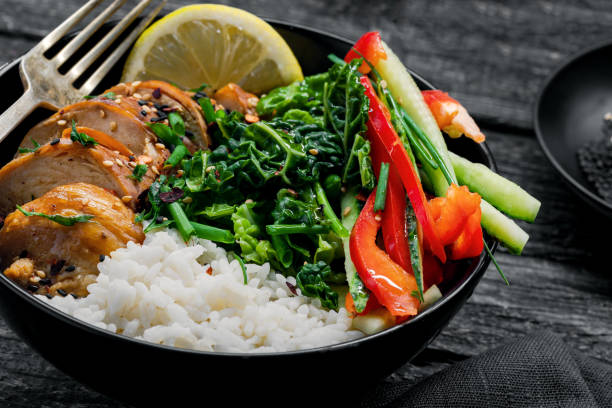 istock Teriyaki chicken with rice and salad 1170892185