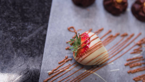 istock Strawberry in white chocolate with caramel 1170895171