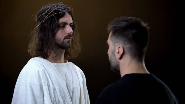 istock Savior looking at man, religious blessing, sins forgiveness, christian kindness 1170896410