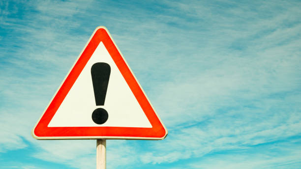 istock Exclamation point of attention against the sky. 1170901986