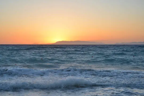 Sunset over Aegean sea, view from Rhodes island in Greece