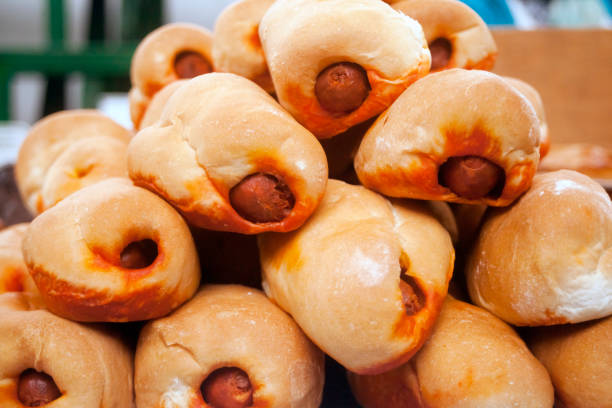 Bread buns filled with Spanish chorizos, Bollos preñados. Traditional festival, Galicia, Spain.