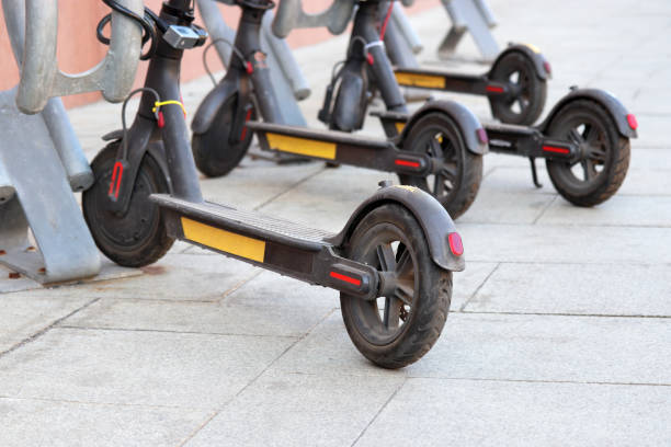 istock Electric scooters parked on a street 1170912058