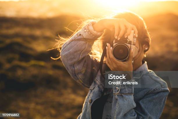 Woman Taking Picture Outdoors Stock Photo - Download Image Now - Photographer, Photographing, Camera - Photographic Equipment