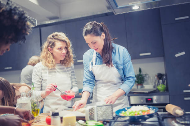 istock A chef is supervising attendees of cooking class 1170919363