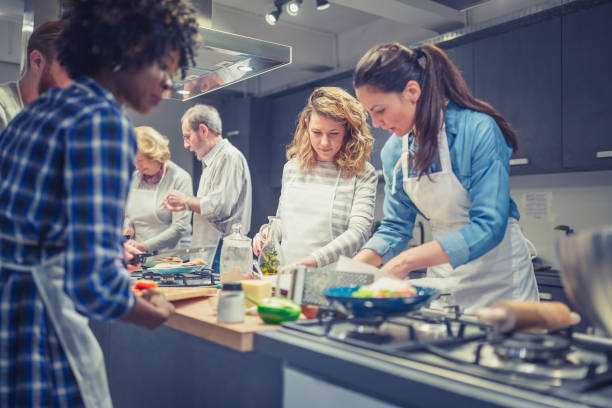 istock A chef is supervising attendees of cooking class 1170919499
