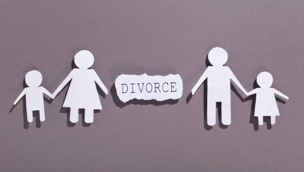 istock Family divorcing and separating children on gray background 1170924547