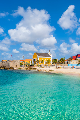 Small beach lapped by turquoise water in Willemstad, the capital city of Curaçao, an island in the southern Caribbean Sea.